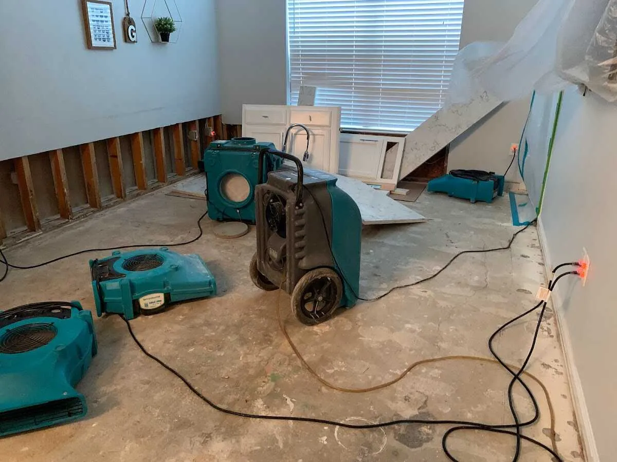 Dehumidifier in flood-cut room for Water Damage Restoration in Lake Barcroft
